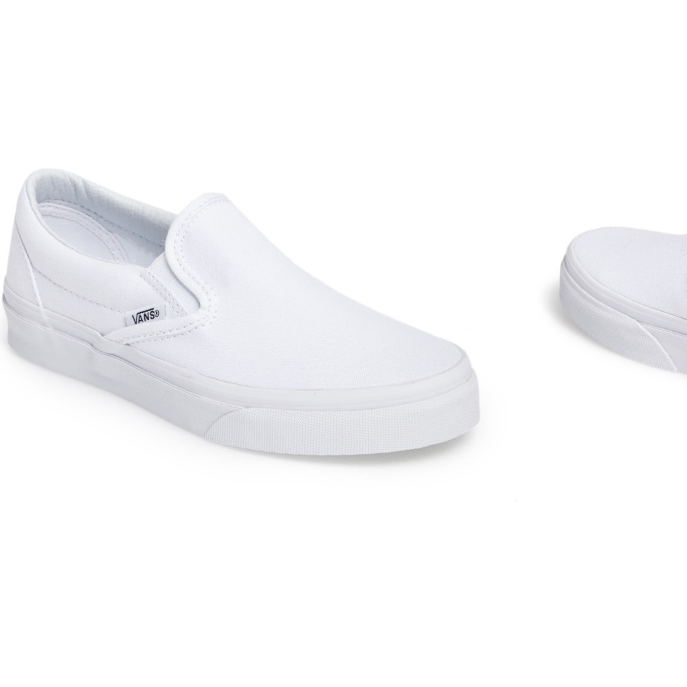 Brand new, never worn slip on vans